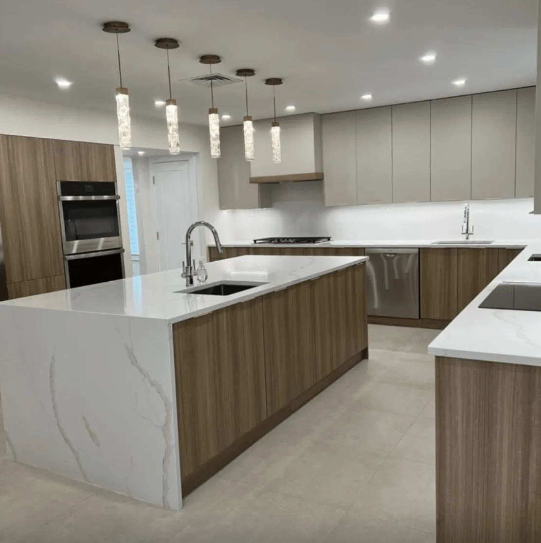 Calacatta Gioia quartz kitchen with waterfall island
