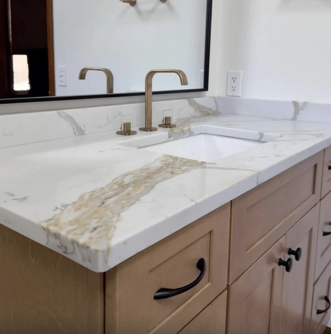 Calacatta Lavish quartz bathroom vanity top with gold veining