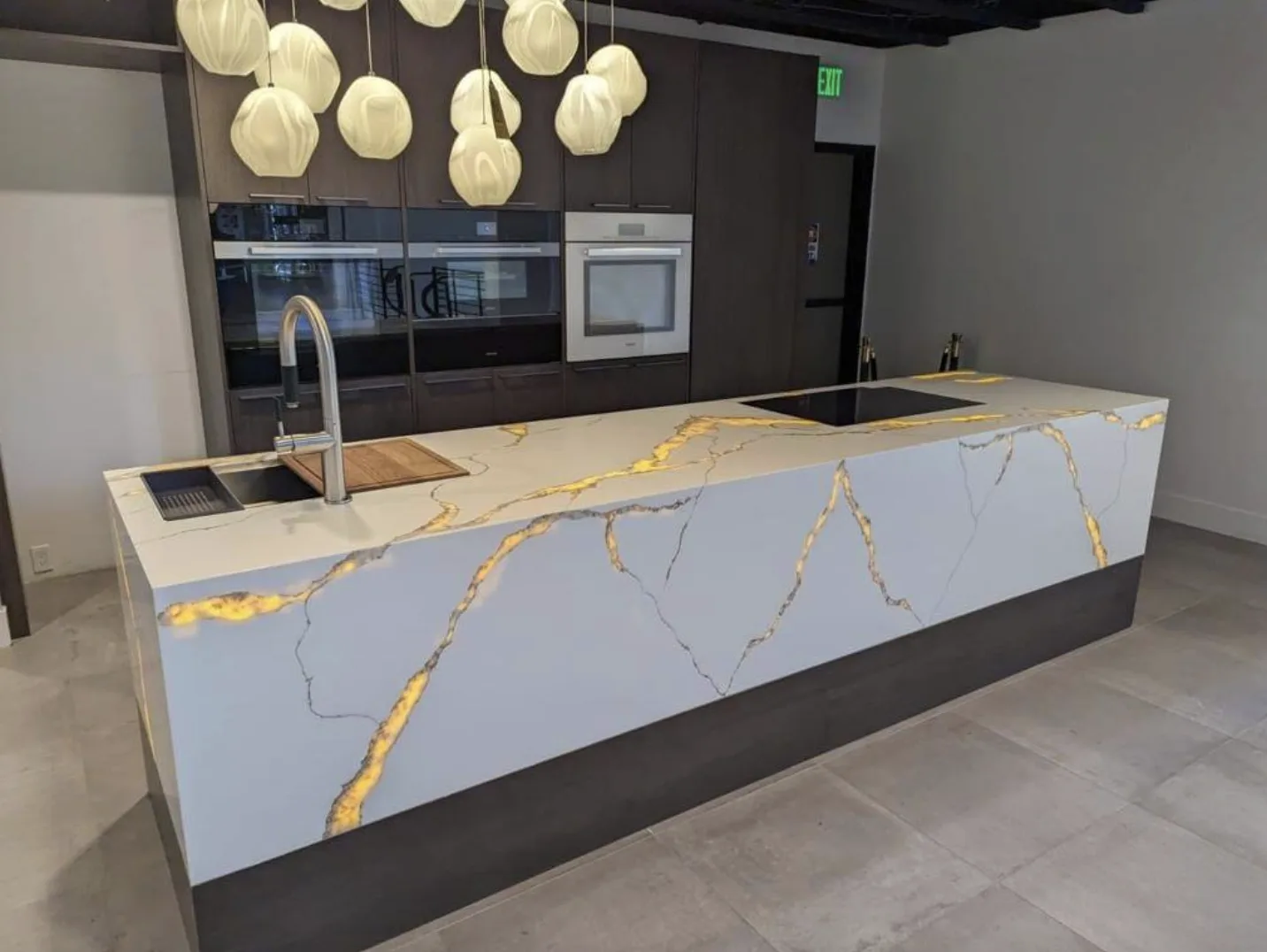 Calacatta Thunder countertop and backsplash matched in the same stone