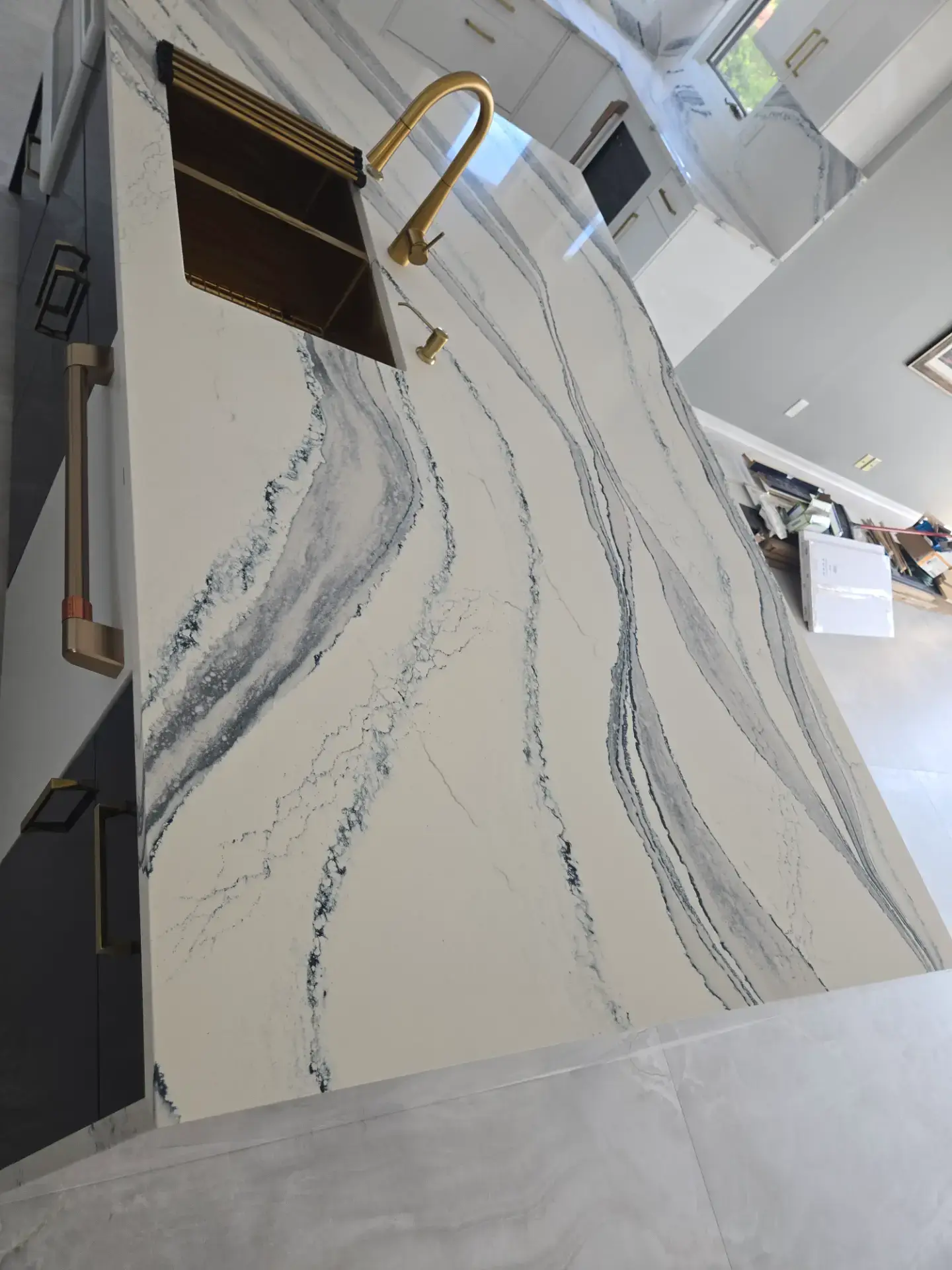 Close view of grey and white veining across a stone slab