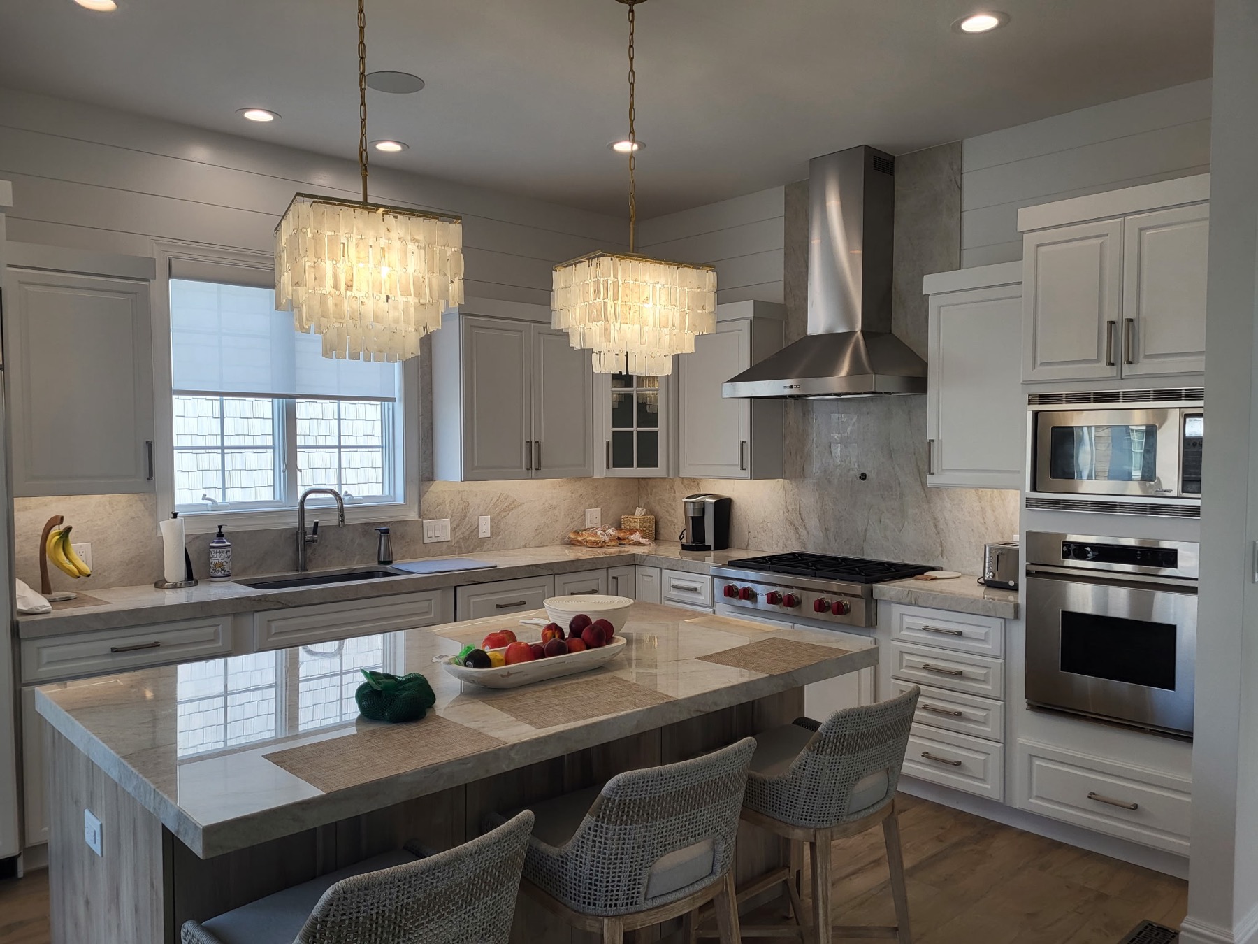 White marble kitchen with island countertop