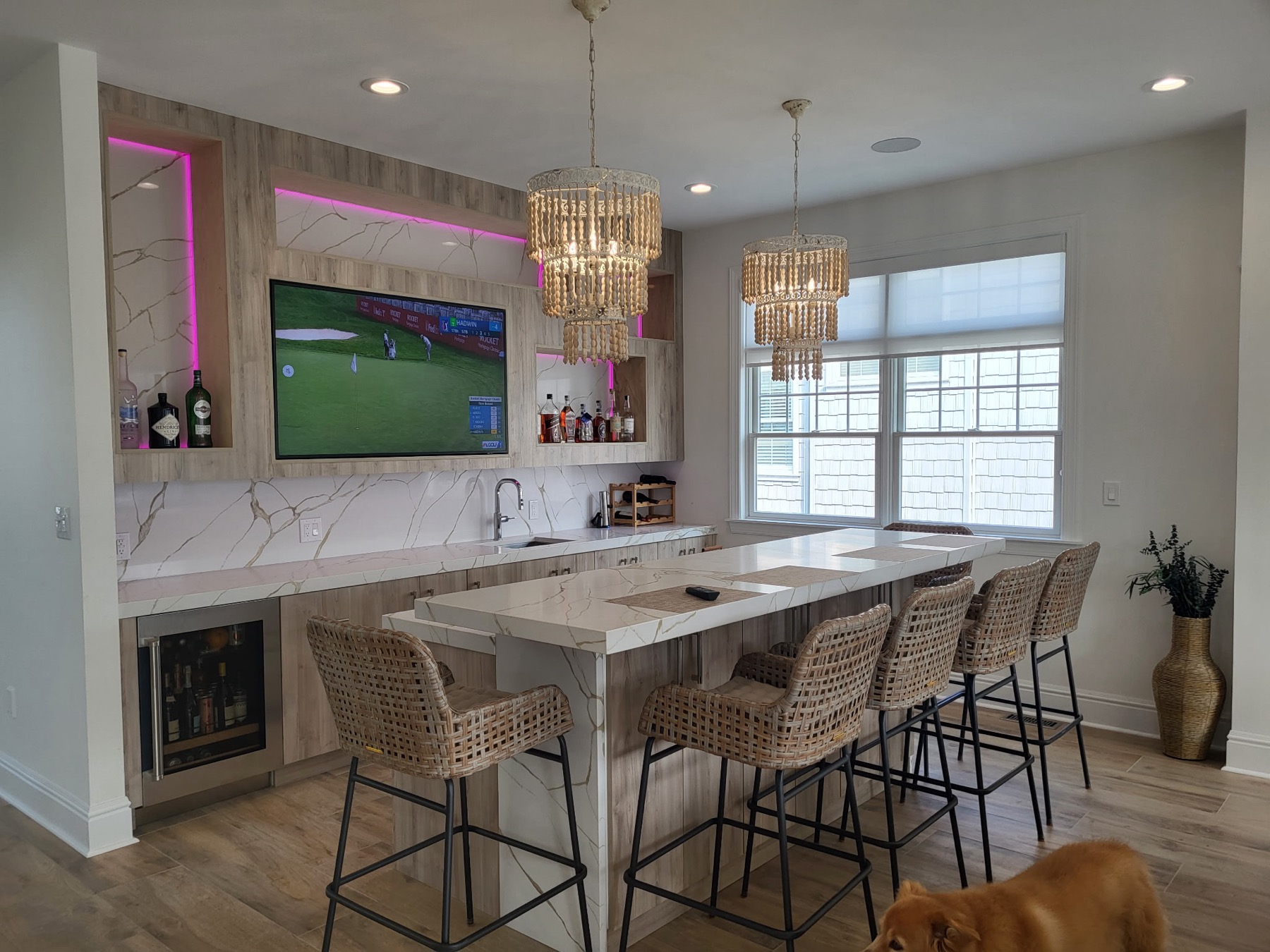 Waterfall edge quartz island countertop with matching backsplash